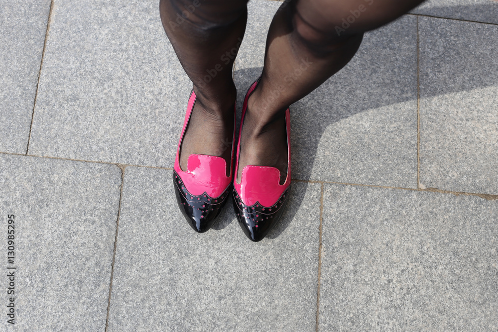 Feet girl and stylish shoes