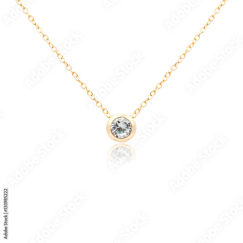 Golden pendant isolated on white