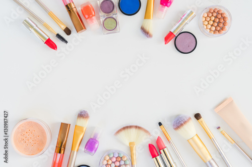 Colorful make up flat lay scene with copy space