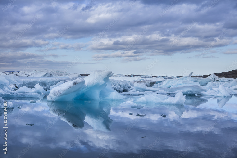 The Jokulsarlon glacier lagoon in Iceland during a bright summer night The Jokulsarlon glacier lagoon in Iceland during a bright summer night