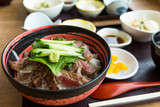 Grilled sliced of beef rice bowl