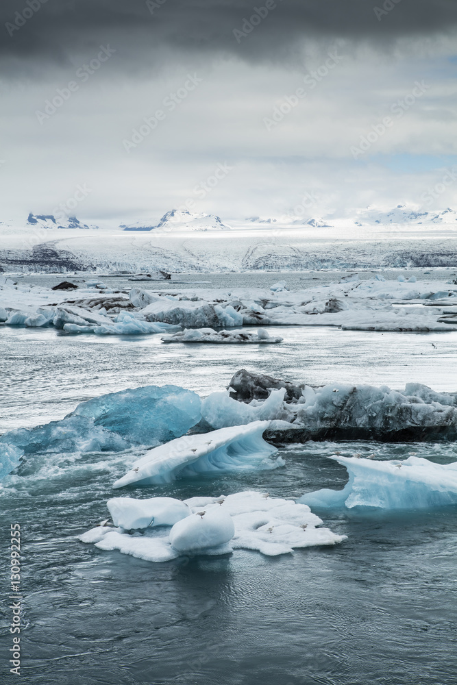 The Jokulsarlon glacier lagoon in Iceland during a bright summer night