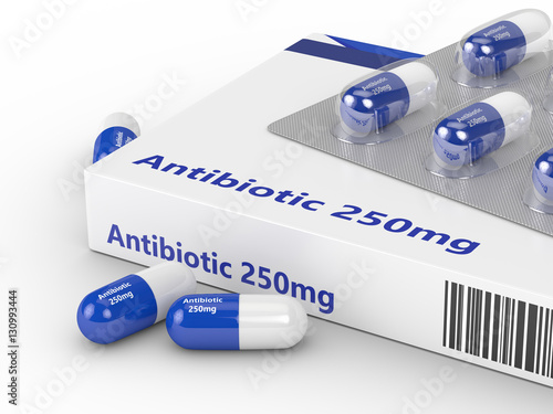 3d rendering of antibiotic pills in blister pack isolated over w photo