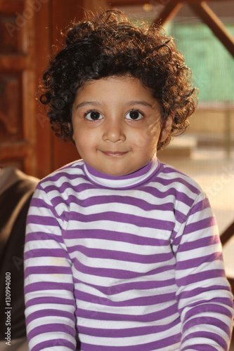 cute curly hair light skin south asian boy Stock Photo Adobe Stock