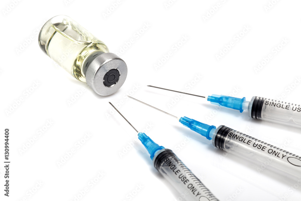 Three transparent medical syringes, Medical ampule with medicament lying near. White background, shadows.
Three transparent medical syringes, Medical ampule with medicament lying near. White background, shadows.