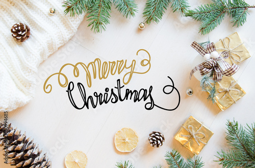 Christmas and New Year gifts, fir branches and pine cones flat lay background