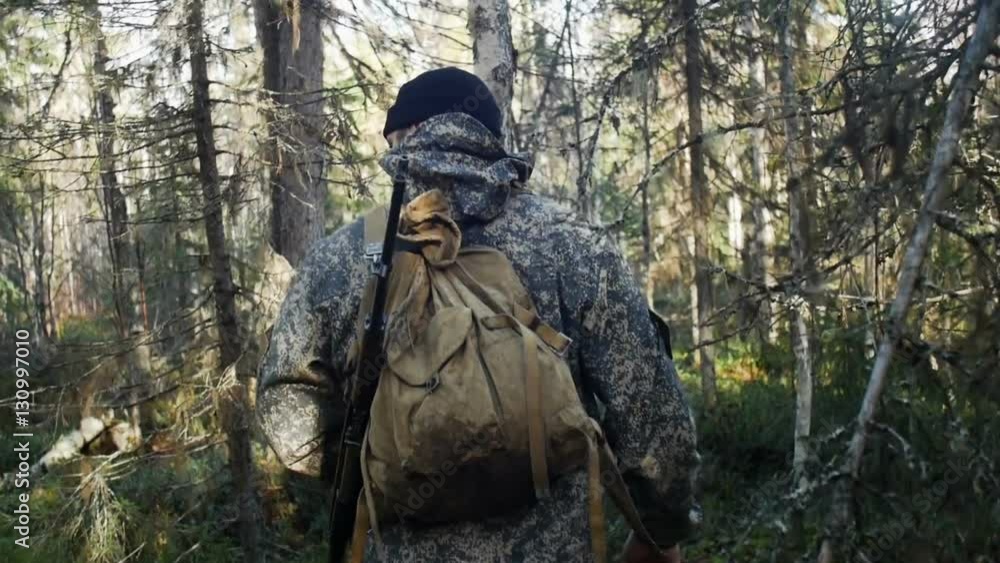 Man hunter outdoor in forest hunting alone Man hunter outdoor in forest hunting alone