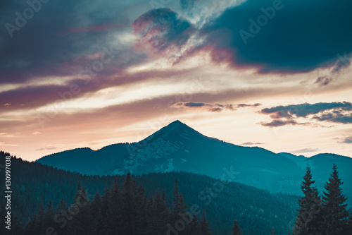 Majestic sunrise in montain landscape. Sunset time. Carpathian, Ukraine, Europe. Beauty world. Vintage filter