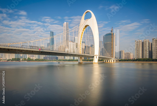 Modern bridge in Zhujiang River and modern building of financial district in guangzhou city, China