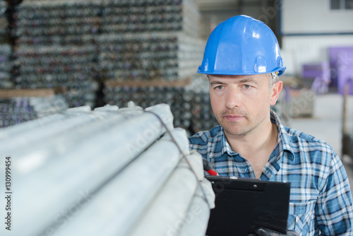 counting steel pipes photo