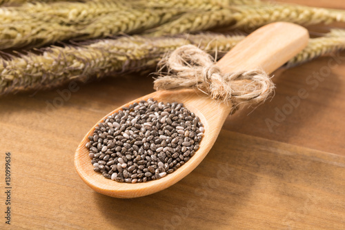 Close-up organics chia seed in a wooden spoon, food for slimming