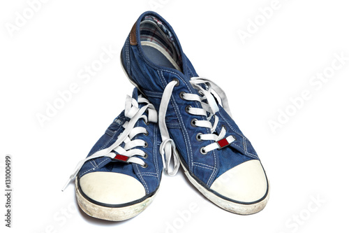 denim sneakers on a white background, isolation