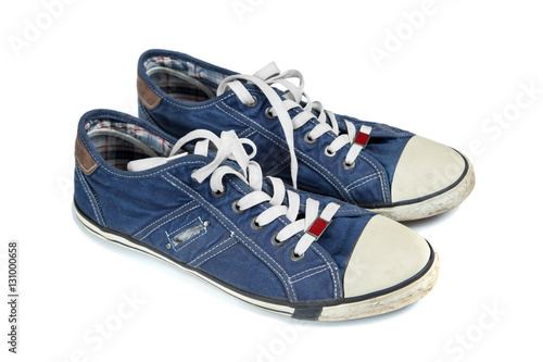 denim sneakers on a white background, isolation