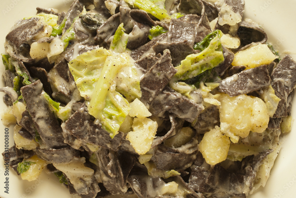 Pizzoccheri della Valtellina, pasta dish from the Alps Pizzoccheri della Valtellina, pasta dish from the Alps