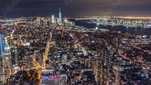 USA, New York City, Manhattan aerial panorama cityscape skyline. On the river floats a large barge