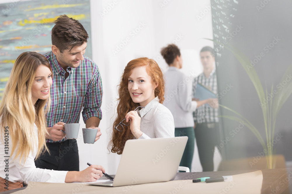 Fototapeta premium Young designer and her partners