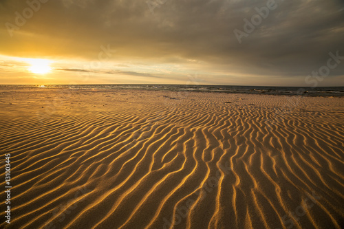 Sand dunes against the sunset light on the beach in northern Poland © Marcin Krzyzak