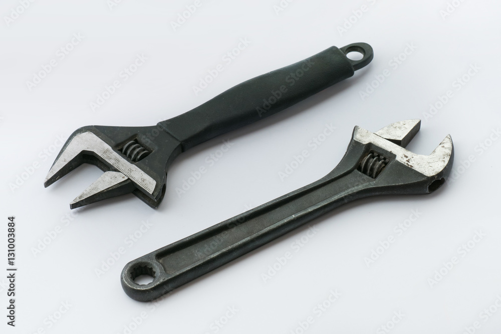 Adjustable spanners, close up / Adjustable spanners isolated on white background Adjustable spanners, close up / Adjustable spanners isolated on white background