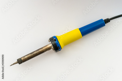 Electric soldering iron, close-up / Electric soldering iron for miniature works on white background