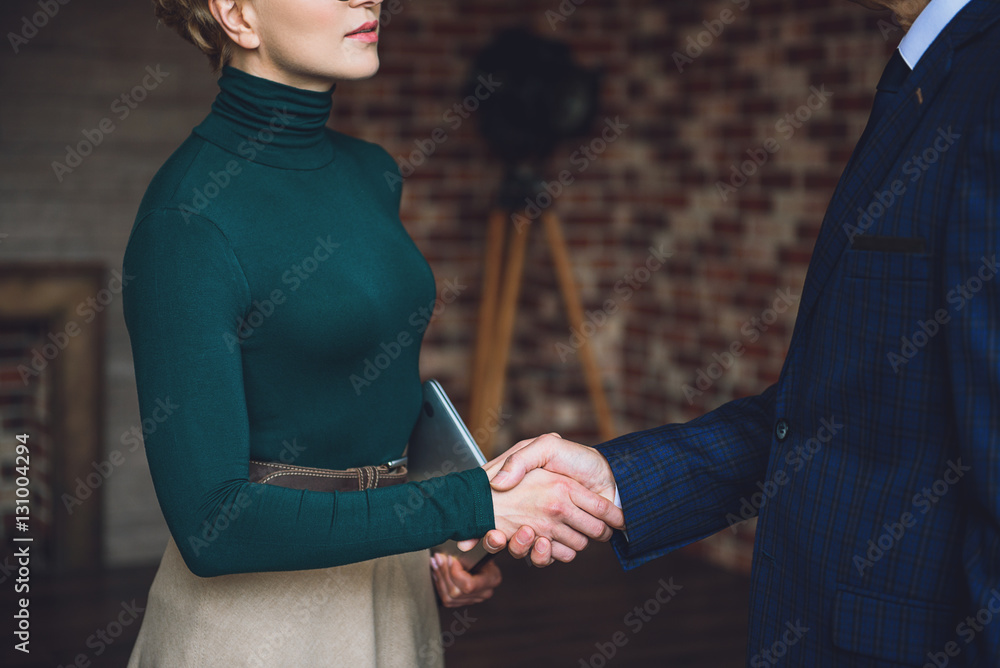 Advisor shaking hand of man Advisor shaking hand of man