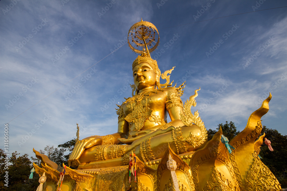 Golden Buddha Image with blue sky Golden Buddha Image with blue sky