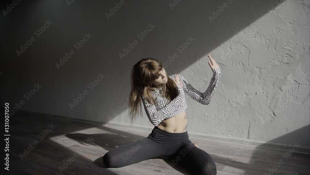 Beautiful, modern teenage girl dancer dancing contemp in the studio slow motion HD Beautiful, modern teenage girl dancer dancing contemp in the studio slow motion HD