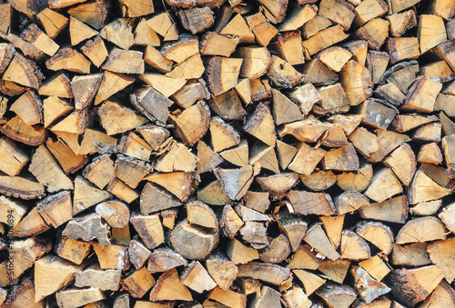 Stacked chopped wood background texture