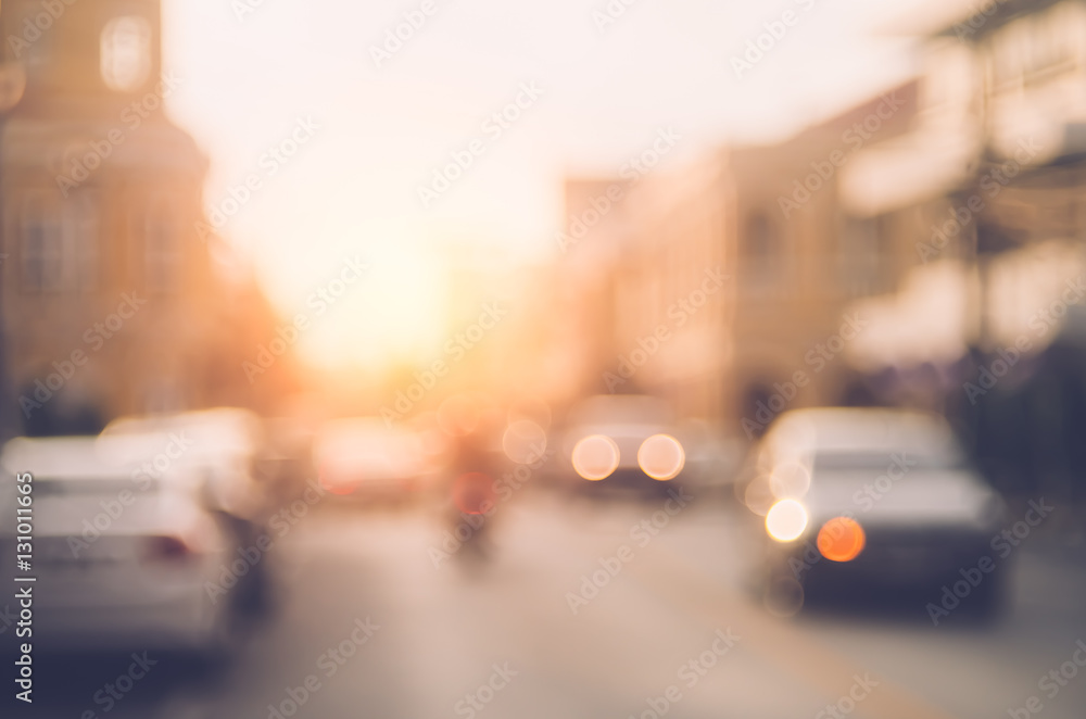 Blur traffic road with colorful bokeh light abstract background.