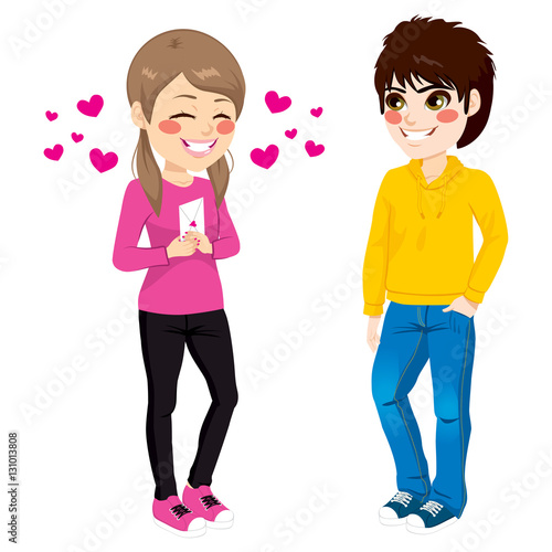 Cute teen girl giving love letter to teenager boy