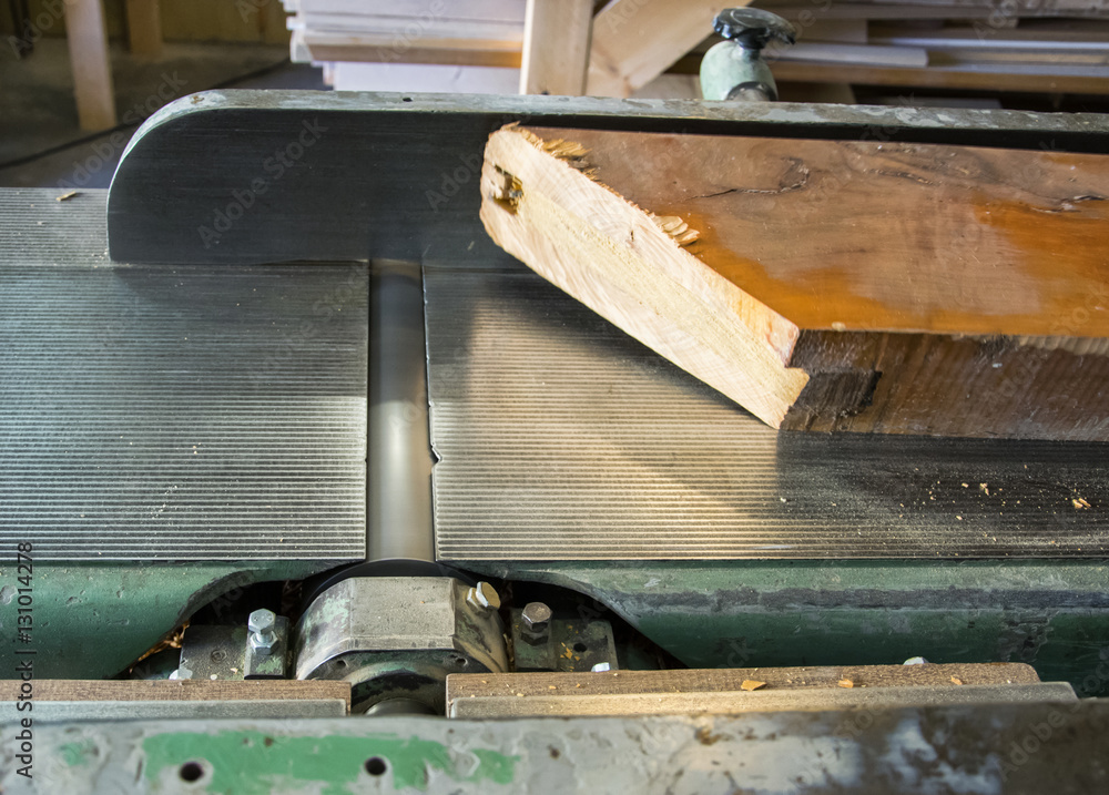 Carpenter workplace. Man using saw to cut wood. Carpenter workplace. Man using saw to cut wood.