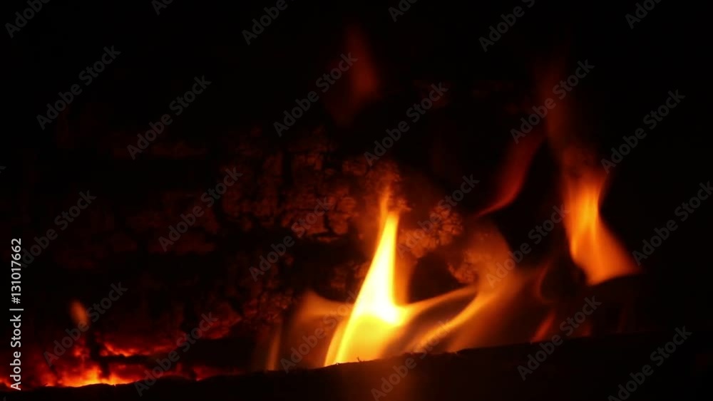 Burning wood logs in fireplace. Burning Fire background Burning wood logs in fireplace. Burning Fire background