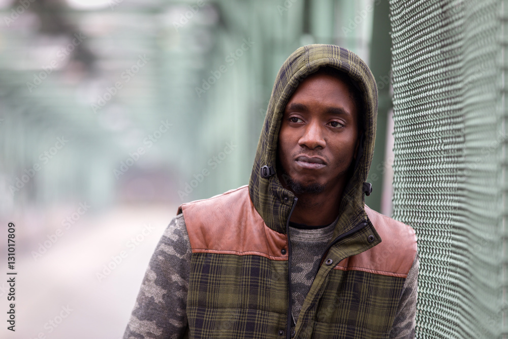 Handsome black man on street on a November day Handsome black man on street on a November day