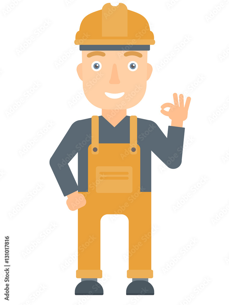 Smiling builder showing ok sign. Smiling builder showing ok sign.