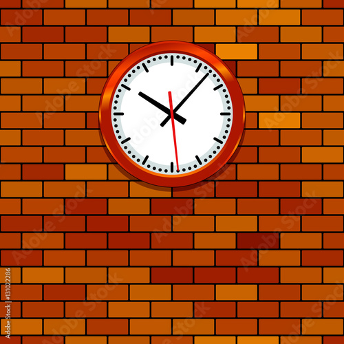 Clock on brick wall