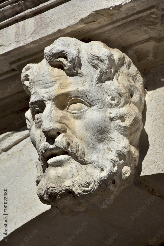 Old stone head decoration in Venice Old stone head decoration in Venice