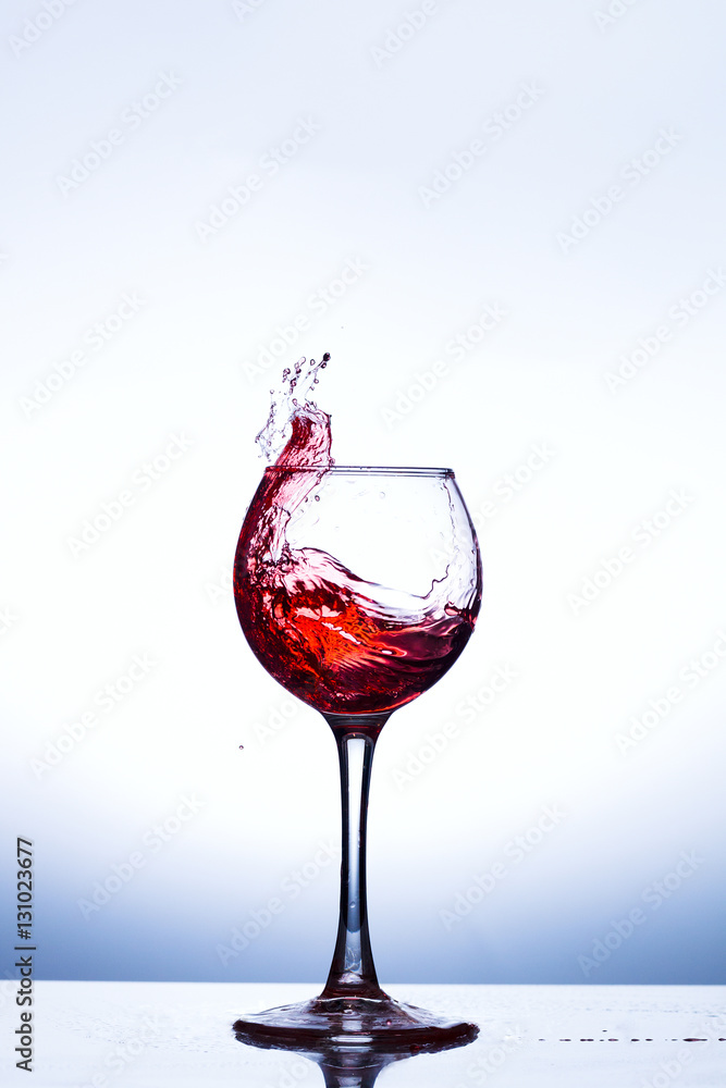 Wine splashing in glass Wine splashing in glass