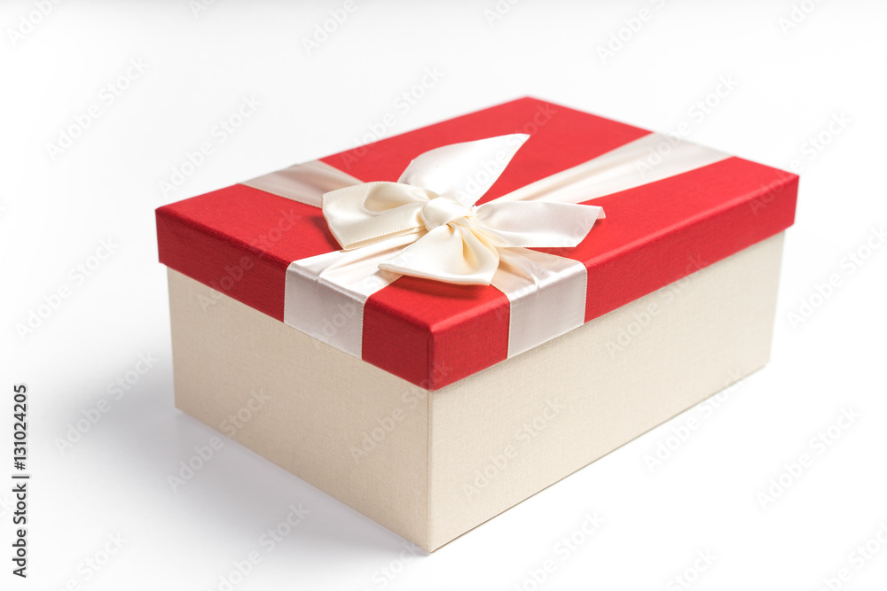 Fototapeta premium Red gift box with white ribbon isolated on white background. 