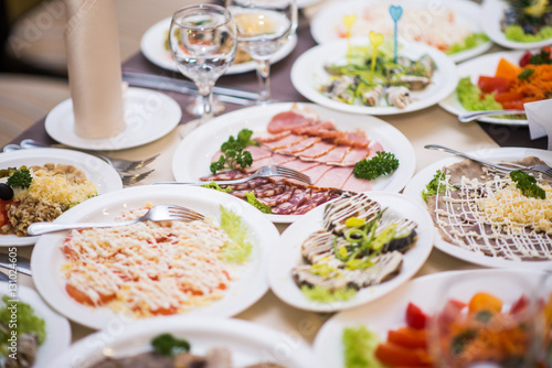 Lots appetizers on a table in a restaurant