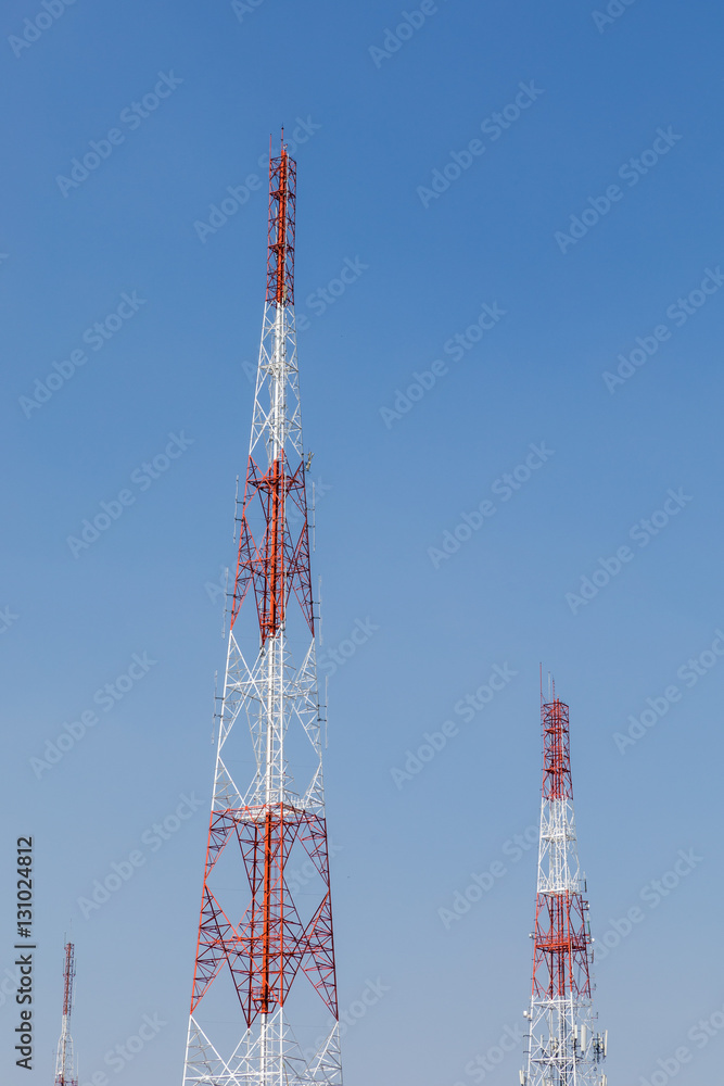 Group of red and white communication tower with beautiful clear sky. Group of red and white communication tower with beautiful clear sky.
