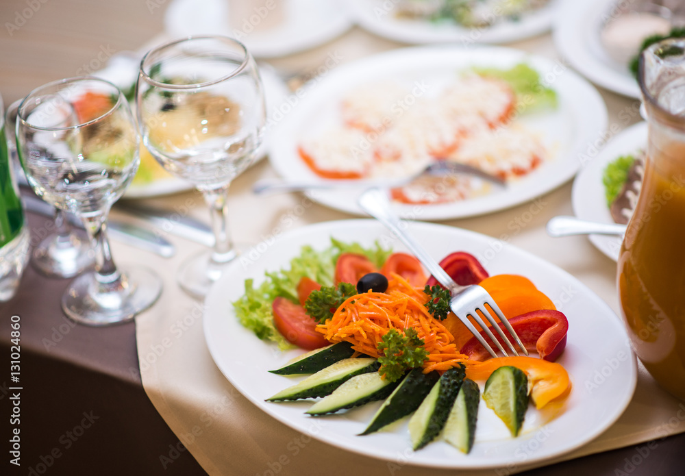 Lots appetizers on a table in a restaurant Lots appetizers on a table in a restaurant