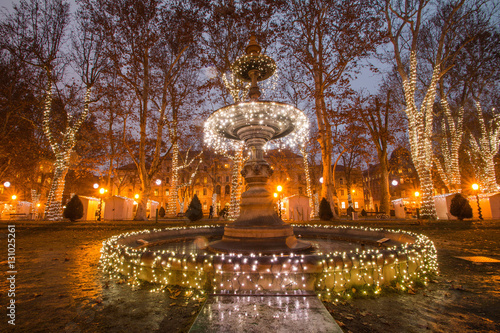 Illuminated fountain in Zrinjevac park, Zagreb, Croatia, Christmas market, Advent photo