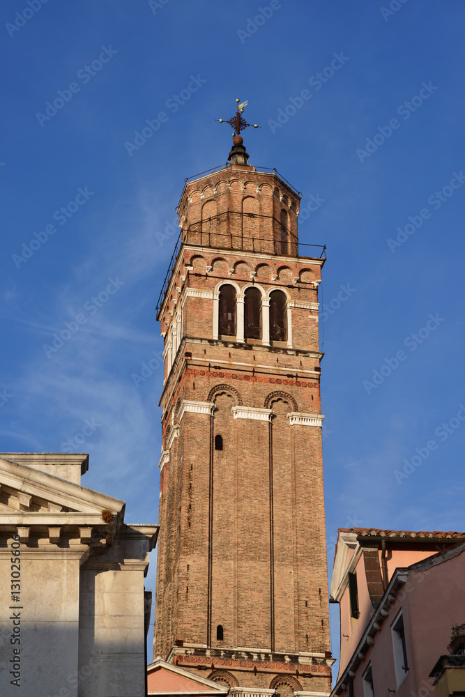 Ancient belfry in the historic center of Venice