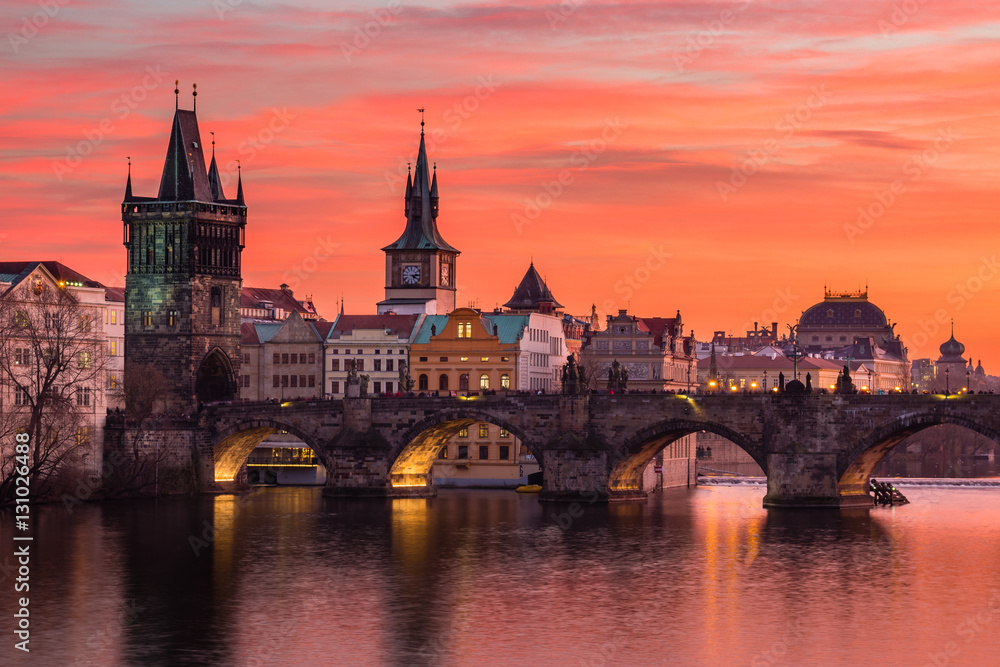 Fototapeta Charles Bridge in Prague with nice sunset sky in background, Czech Republic
