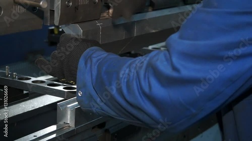 Machine For Cutting Sheet Metal In The Work
