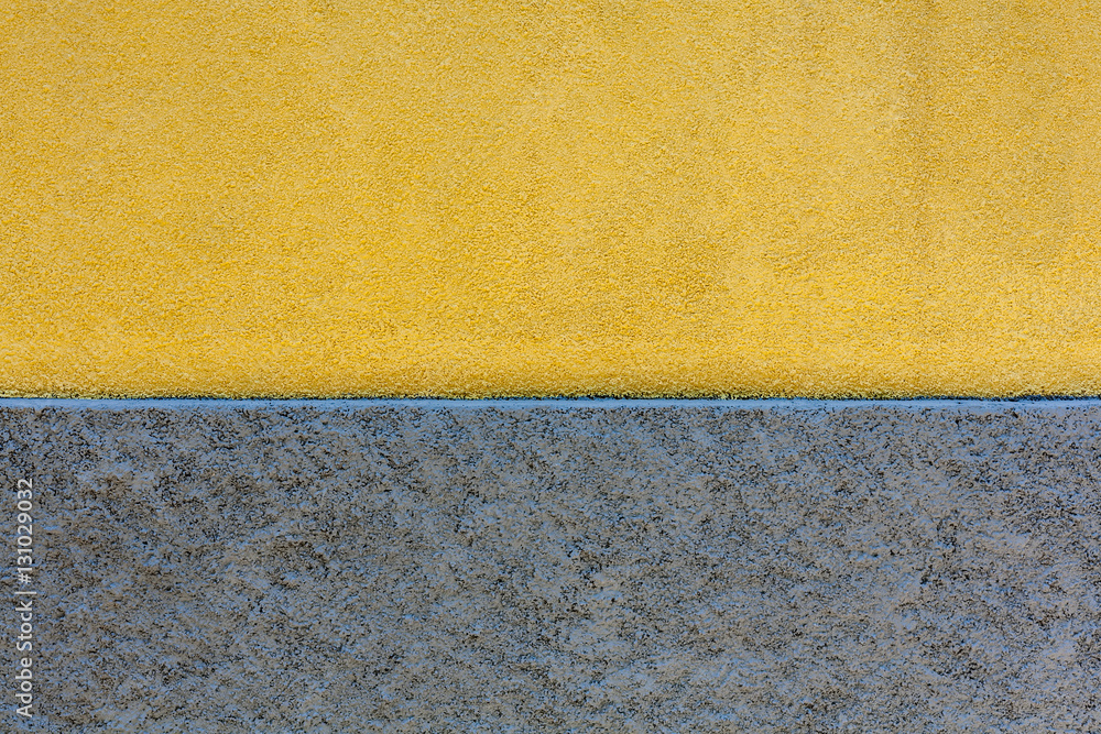 Fototapeta premium Yellow and gray wall for background