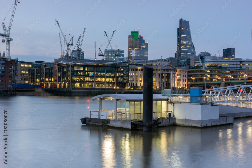 LONDON, ENGLAND - JUNE 17 2016: Night Photo of Thames River and skyscrapers,  London, Great Britain