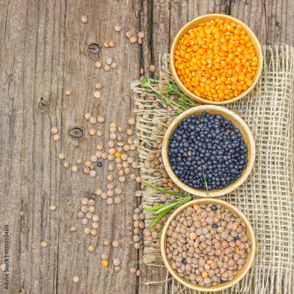Fototapeta premium wooden bowls with lentils