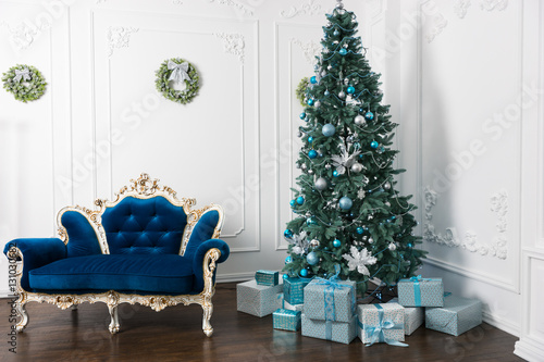 Christmas tree with a lot of presents and different decorations