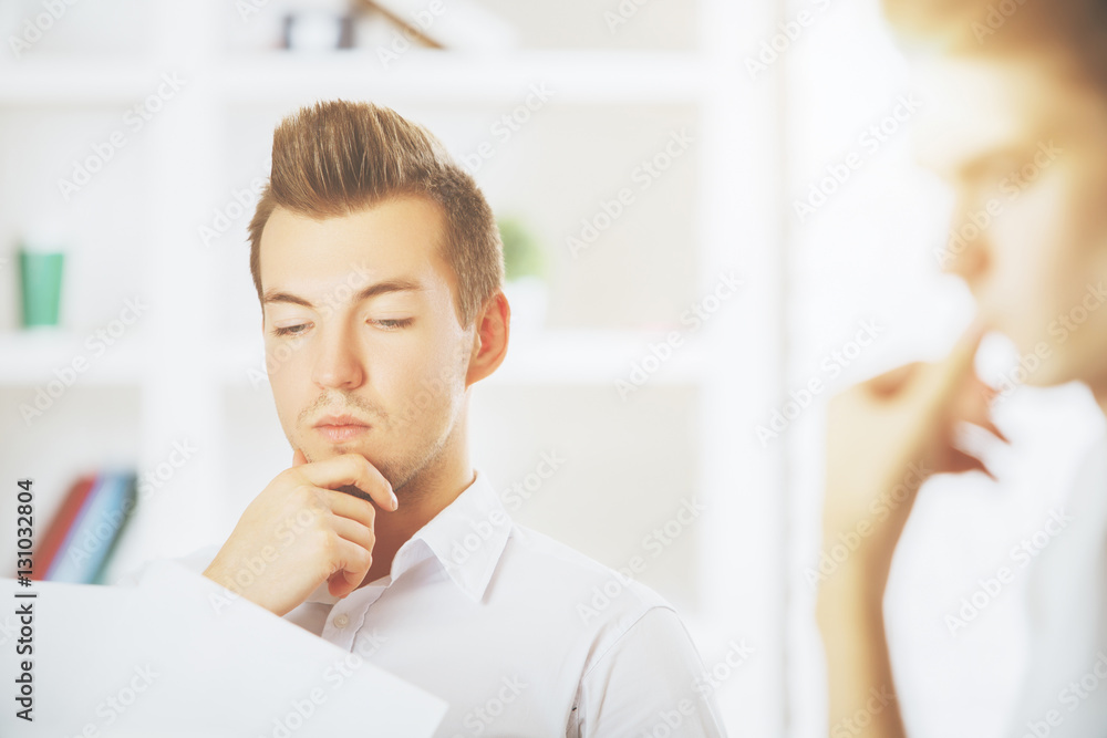 Fototapeta premium Handsome guys doing paperwork