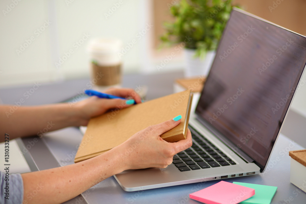 Fototapeta premium Designer working at desk using digitizer in his office